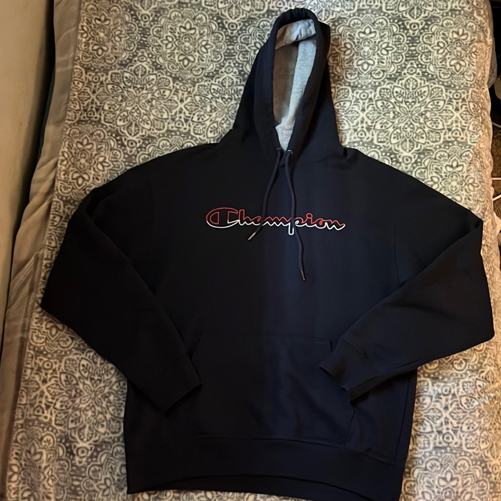 Navy blue Champion hoodie with red and white lettering in a Mens Large!